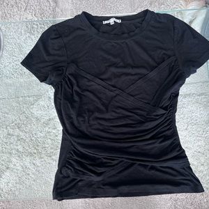 Black shirt, really casual and able to style with anything